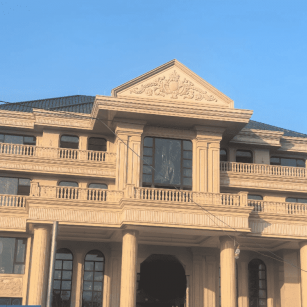 济南黄金麻别墅外墙干挂石材效果示例