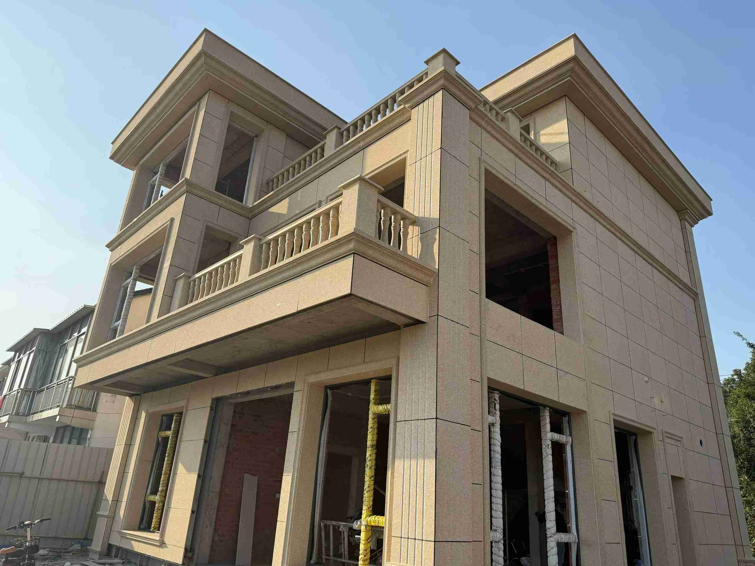 济南 黄金麻花岗岩石材荔枝面外墙干挂效果展示